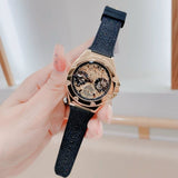 Guess Asteria Multifunction Gold Dial Black Rubber Strap Watch For Women - GW0620L2