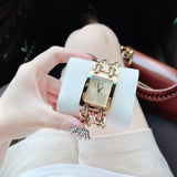 Guess Mod Heavy Metal Gold Dial Gold Steel Strap Watch For Women - W1117L2
