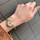Tory Burch Riva Gold Dial Gold Steel Strap Watch for Women - TBW4029