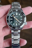 Seiko Prospex 140th Anniversary Limited Edition Automatic Scuba Divers Green Dial Silver Steel Strap Watch for Men - SPB207J1